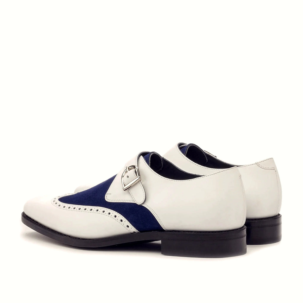 Navy kid suede beside the white box calf