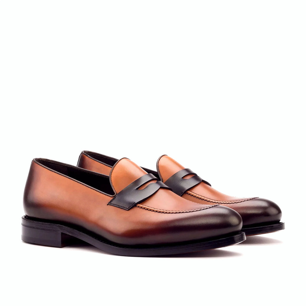 Burnished dark brown deepening at the toe