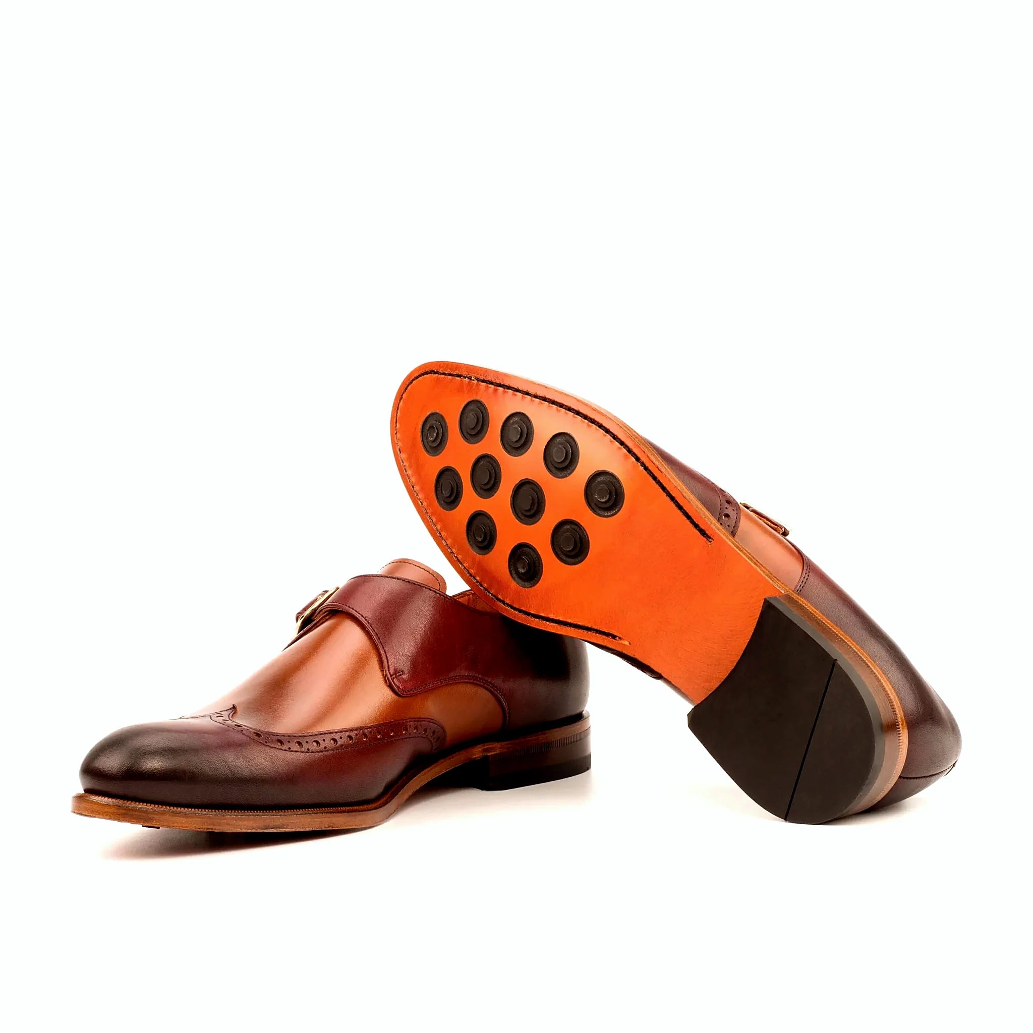 Leather sole with buttons rubber injections