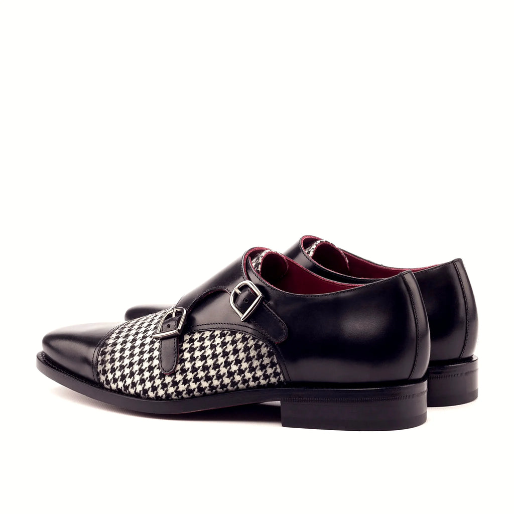 Black painted calf beside the houndstooth