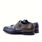 Grey painted calf beside the plaid