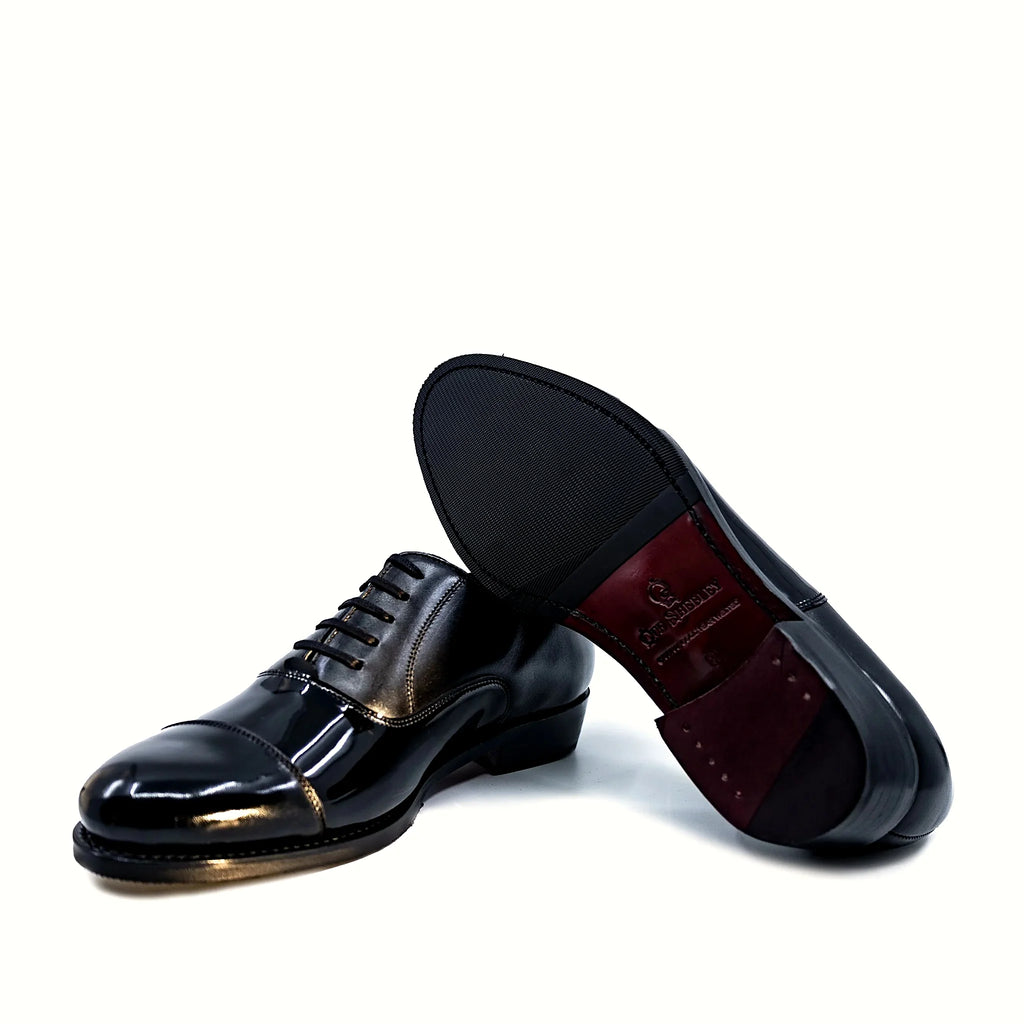 Dark red leather sole with rubber protector