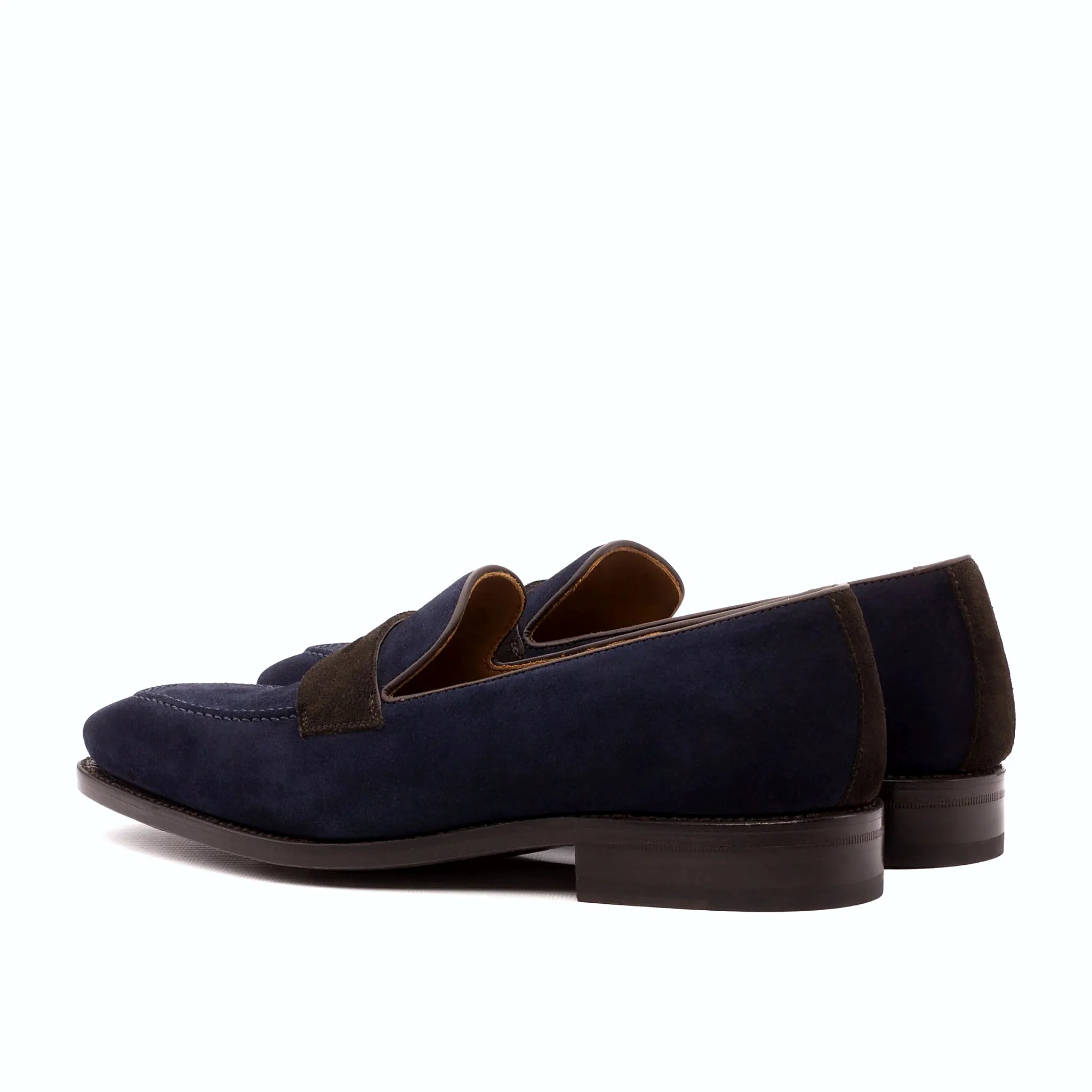 Navy lux suede beside the dark brown