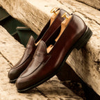 Rounded toe on the burgundy loafer
