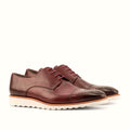 Burgundy derby with quarters sewn over the vamp