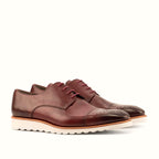 Burgundy derby with quarters sewn over the vamp