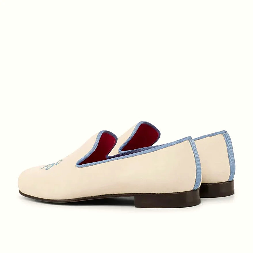 Medium blue grossgrain beside the suede