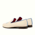 Medium blue grossgrain beside the suede