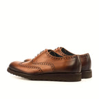 Brogue pattern across the toe cap