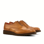 Cognac painted calf brogue across the whole upper