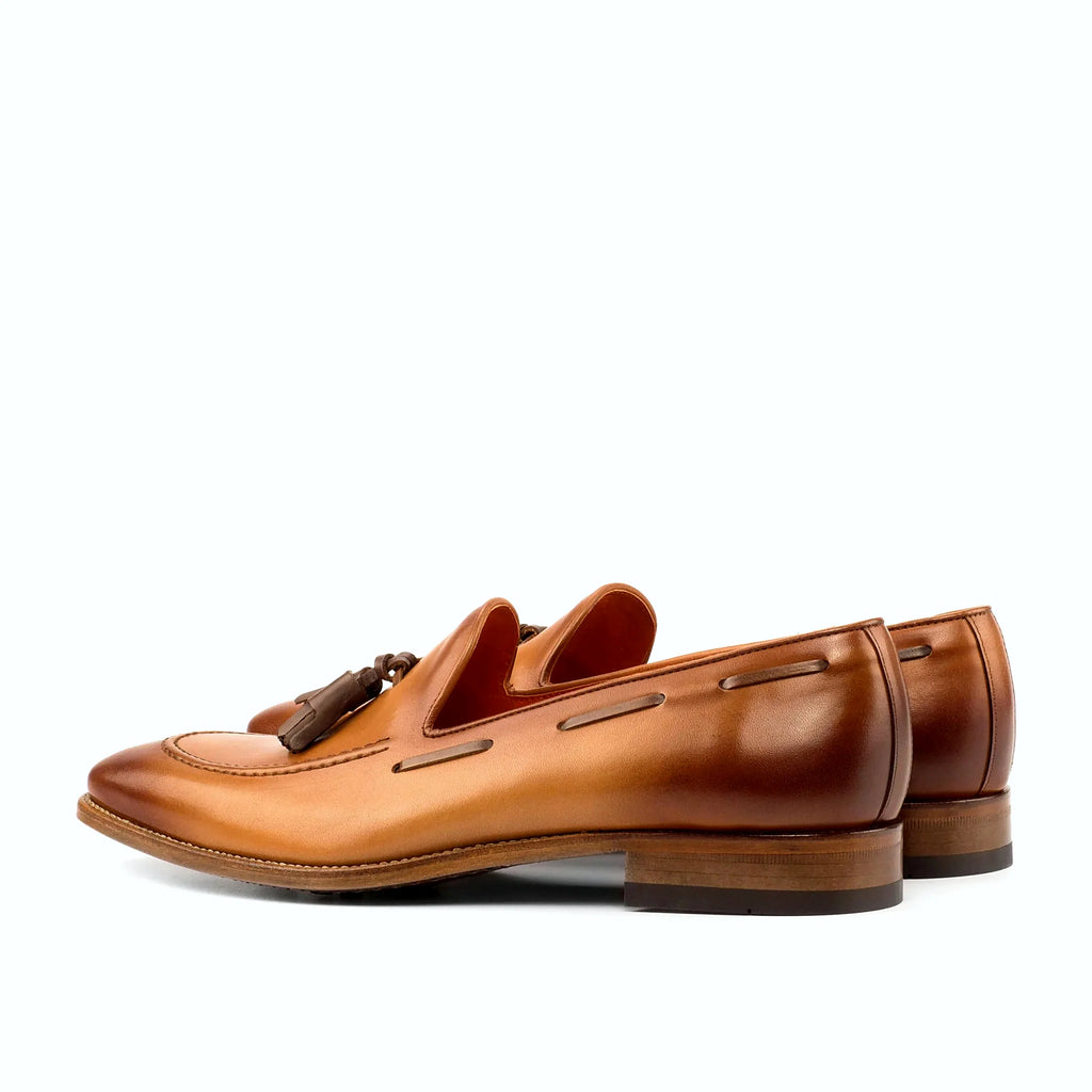 Dark brown painted calf beside the cognac