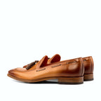 Dark brown painted calf beside the cognac