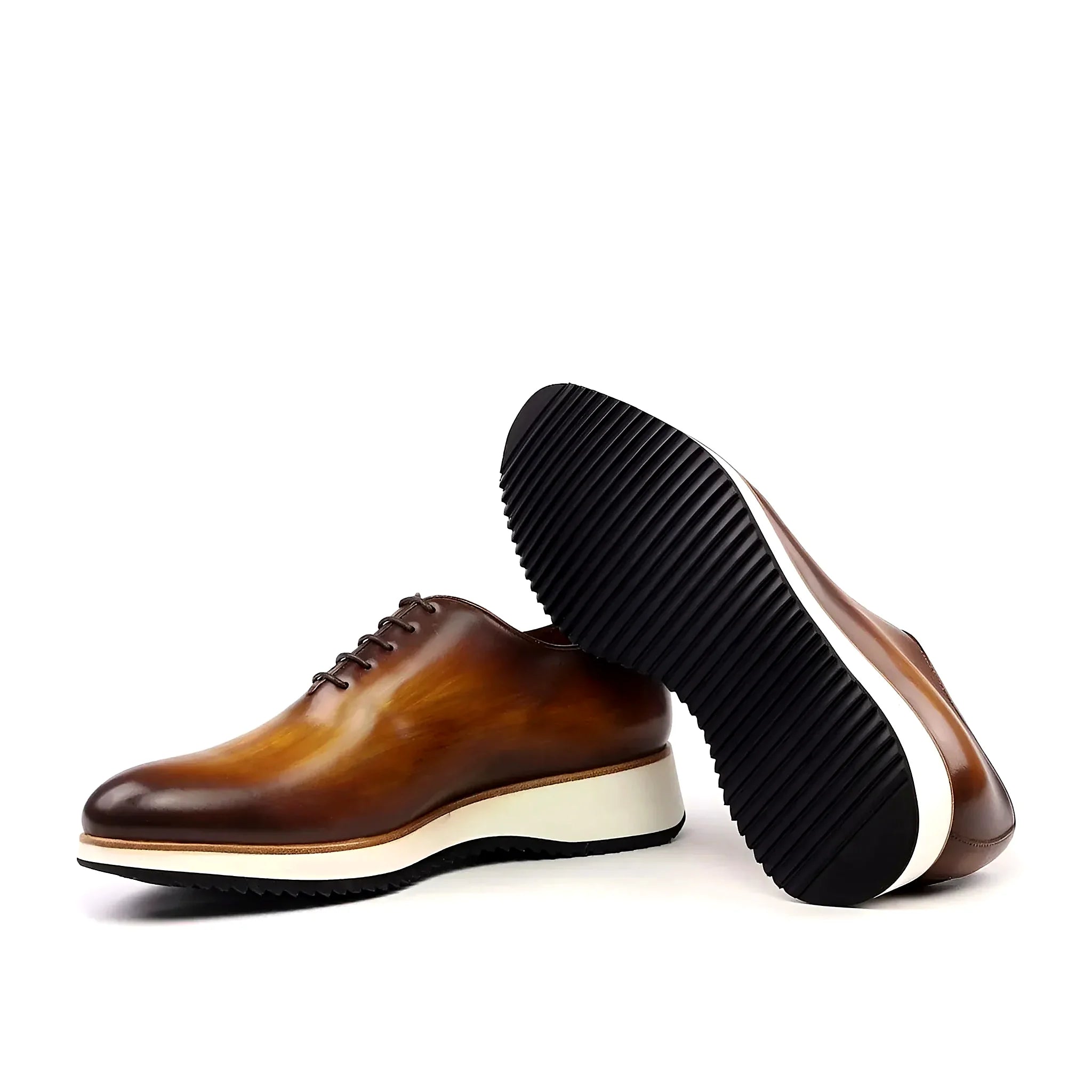 Running sole under the wholecut