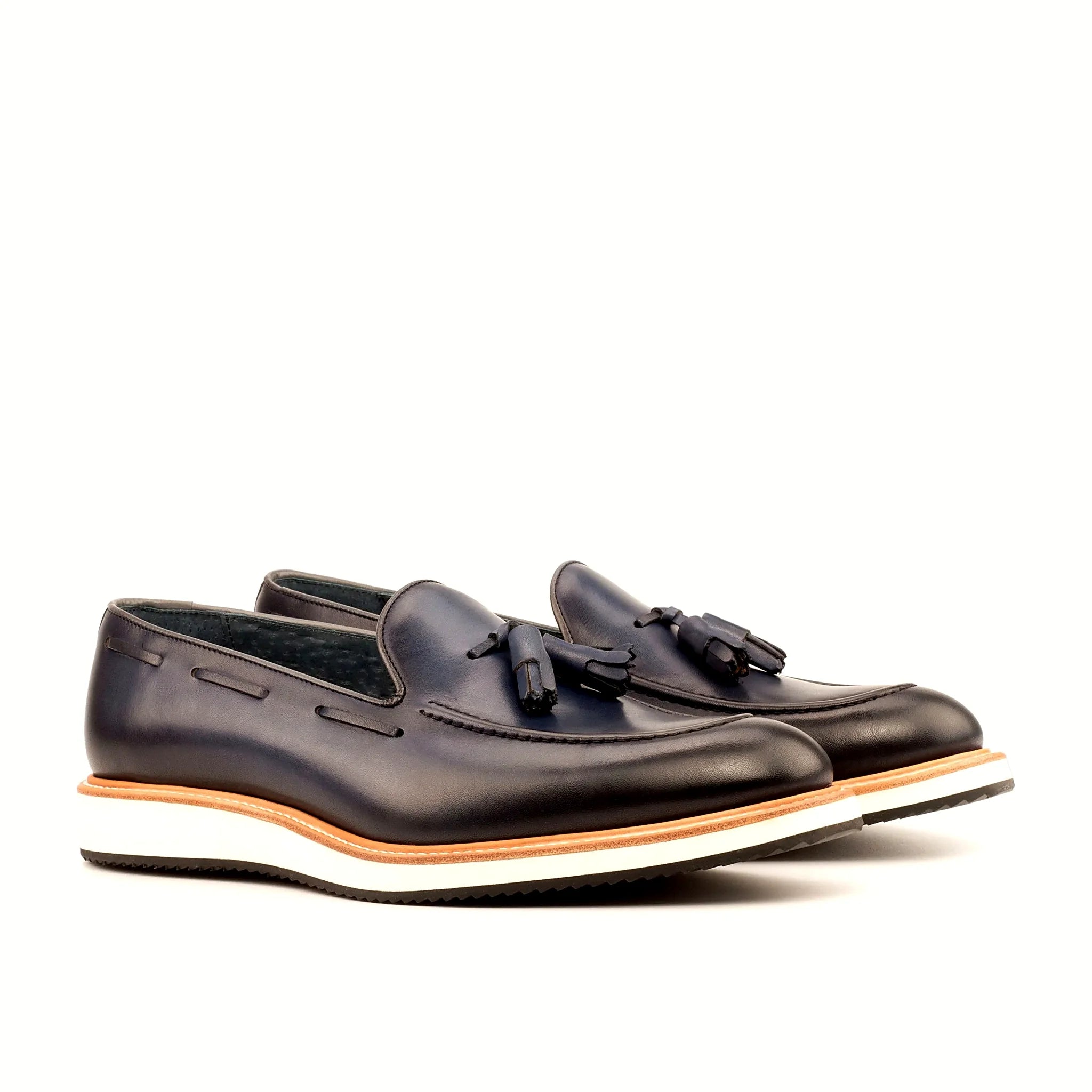 Burnished navy loafer, deeper at toe and heel