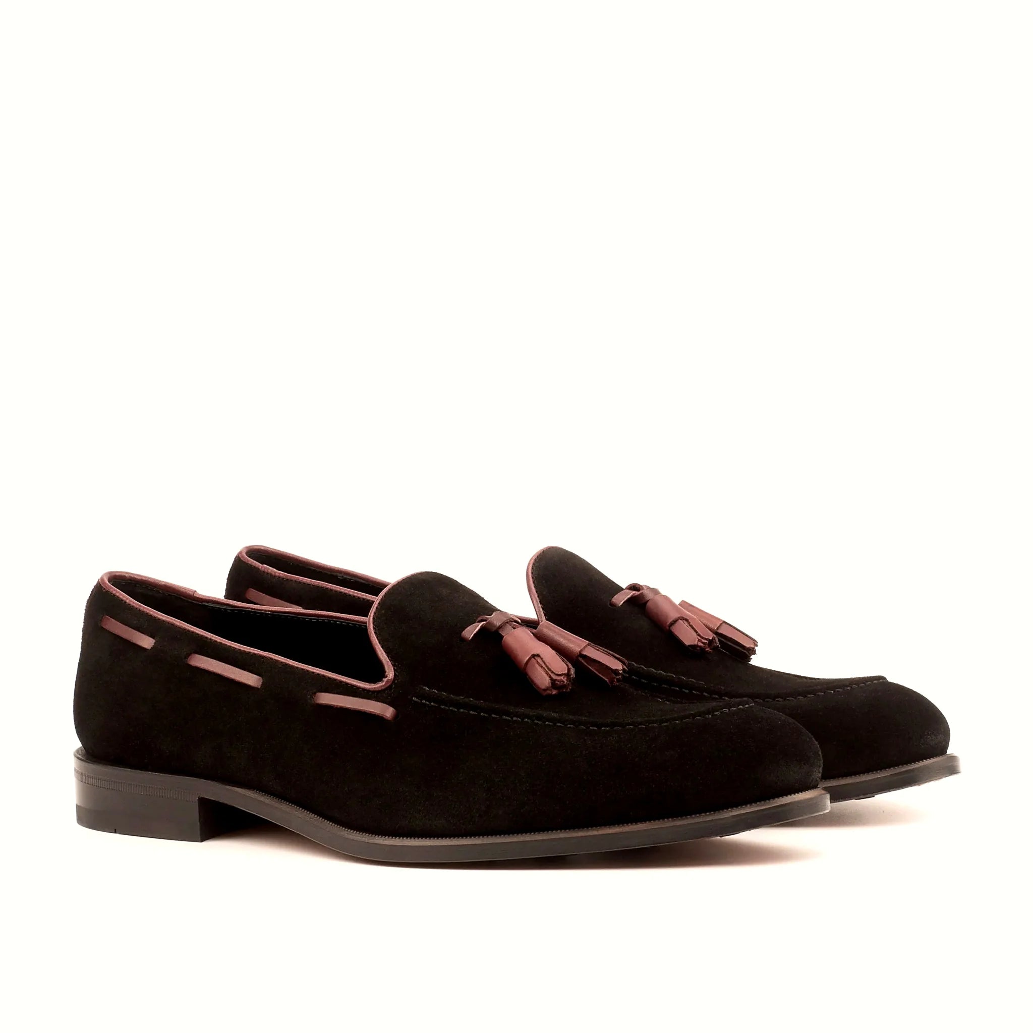 Black suede loafer with burgundy panels