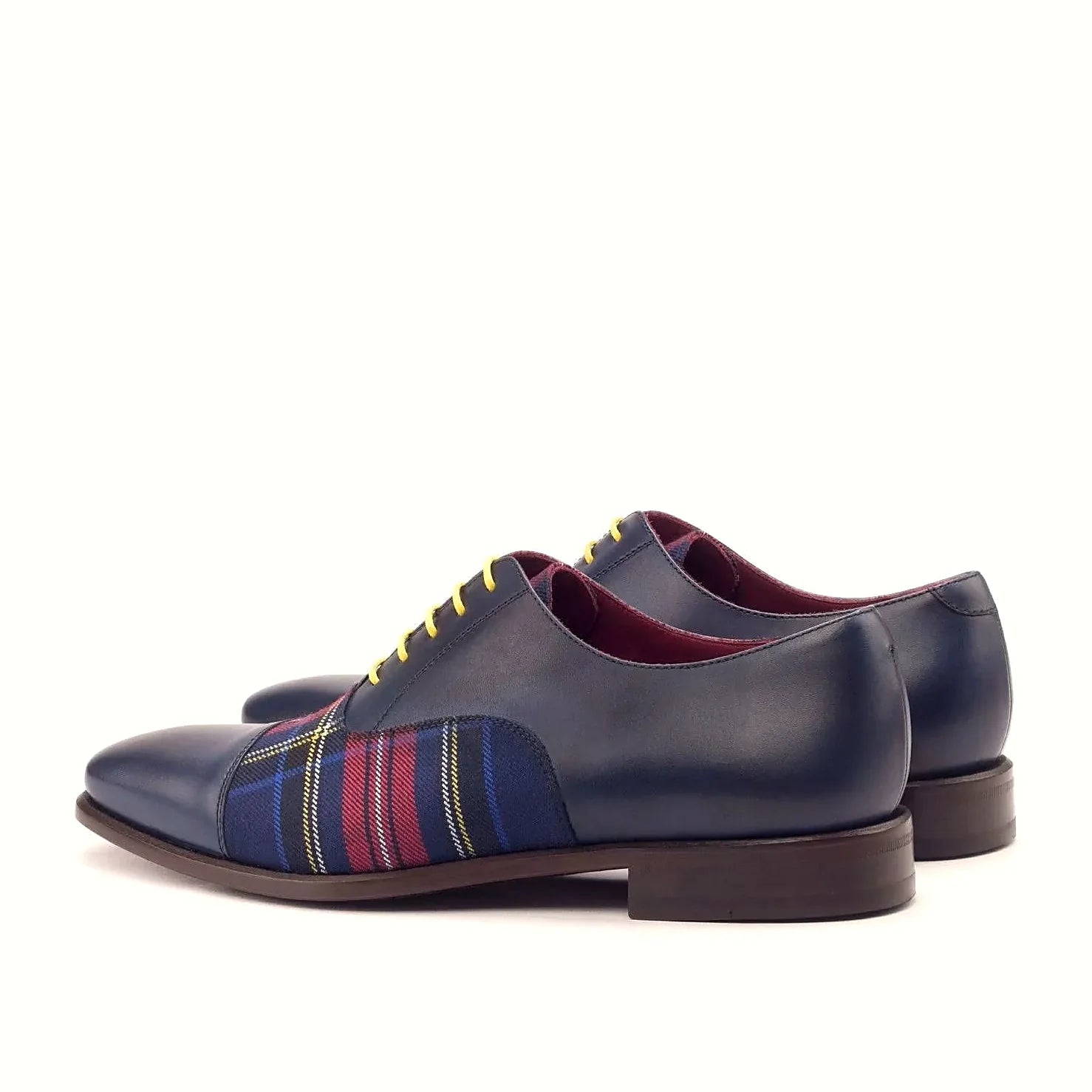 Navy painted calf beside the tartan