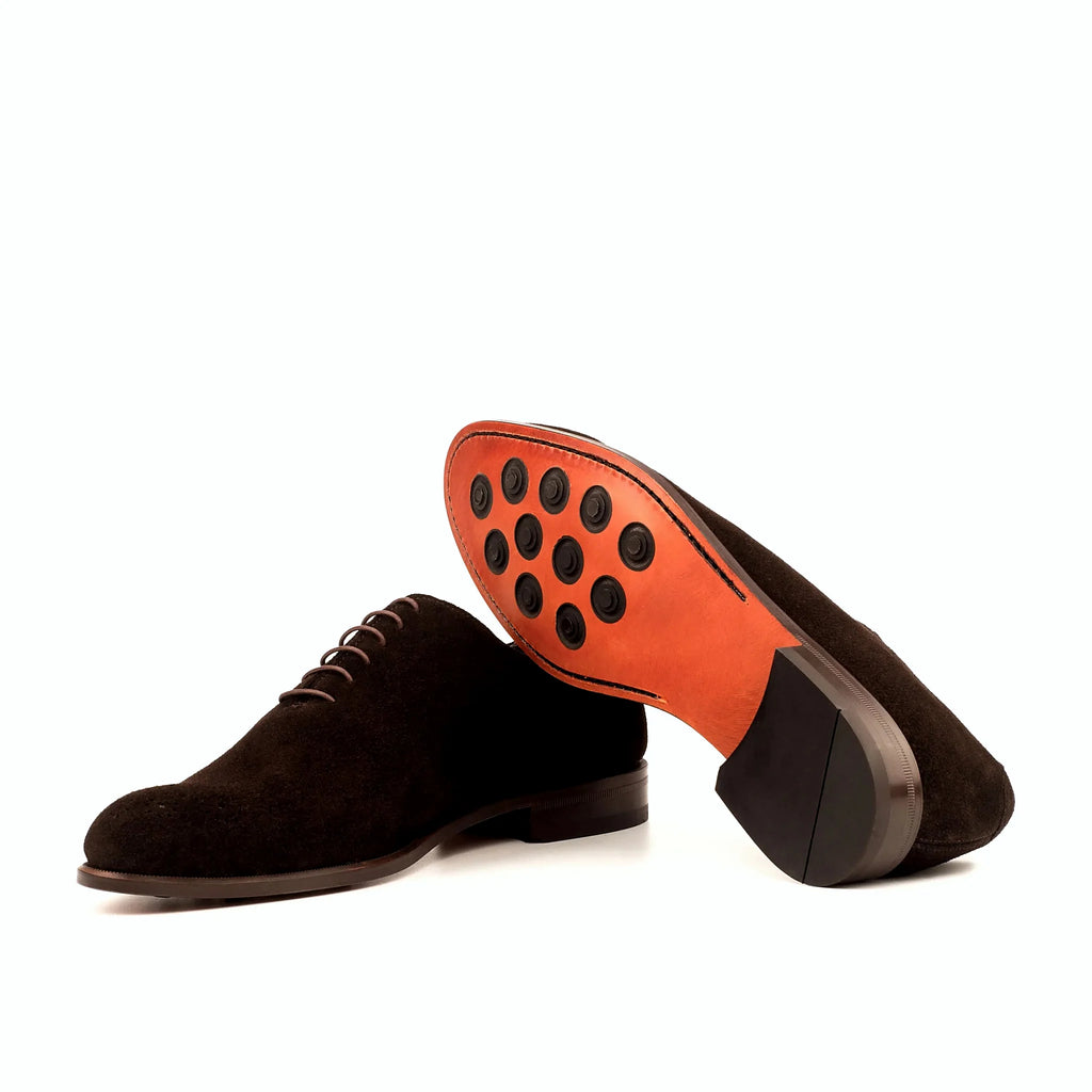 Leather sole with buttons rubber injections