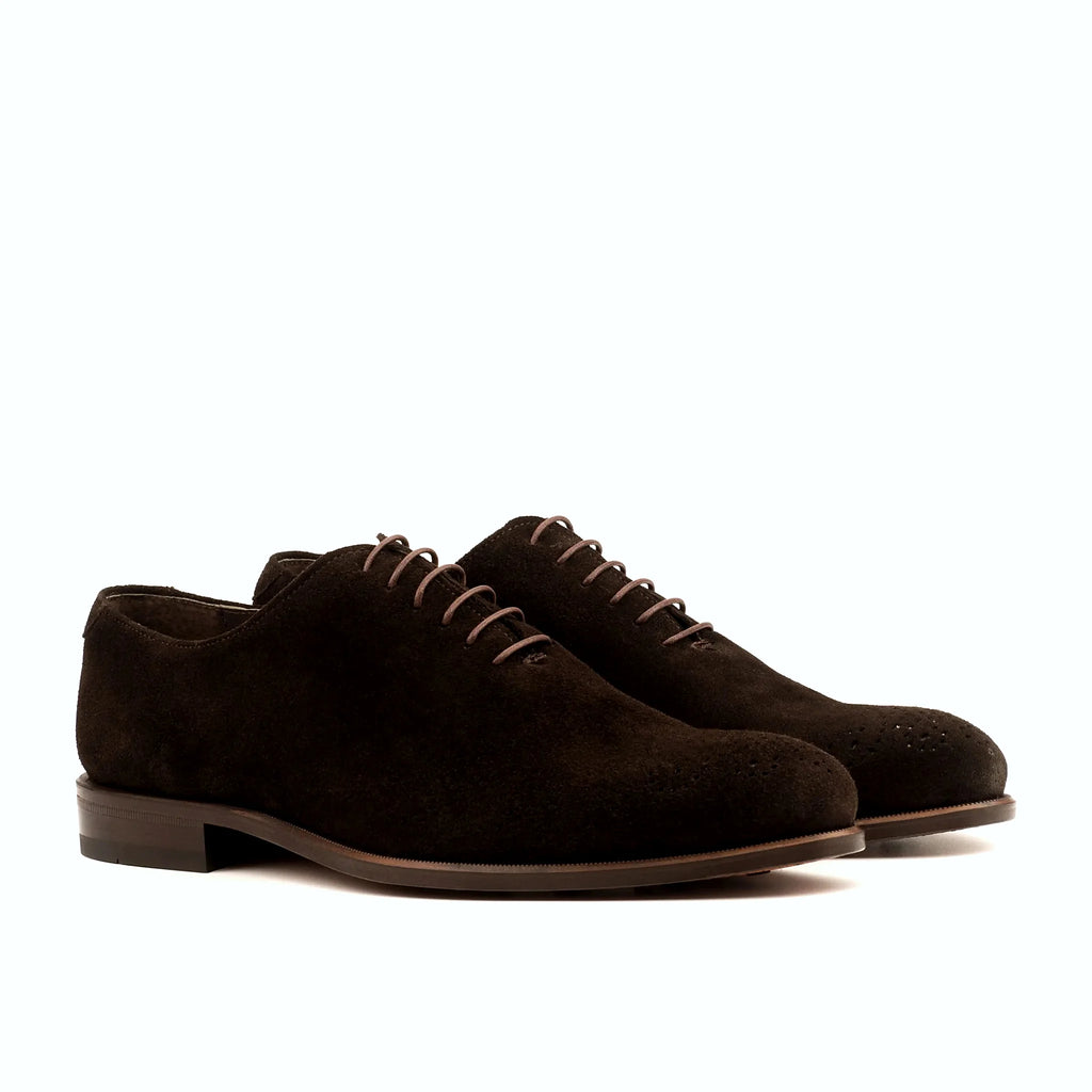 Dark brown suede wholecut with almost no stitching