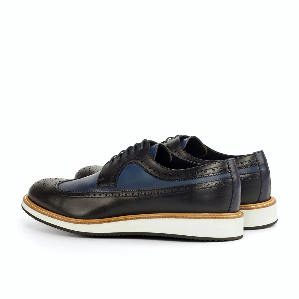 Navy box calf beside the black