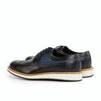 Navy box calf beside the black