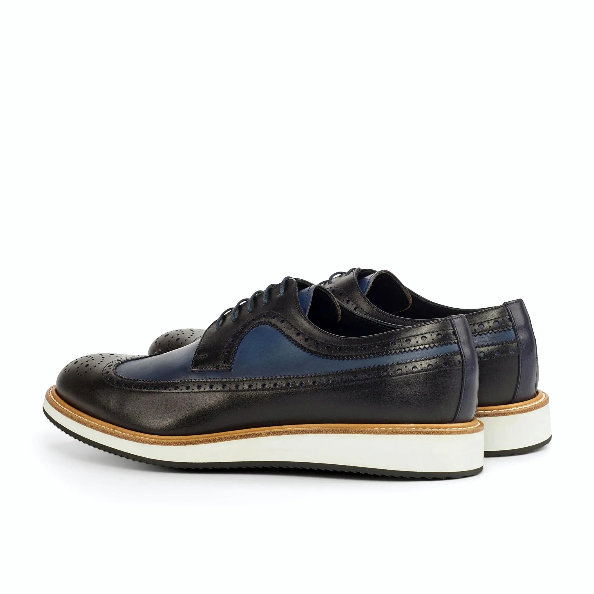 Navy box calf beside the black