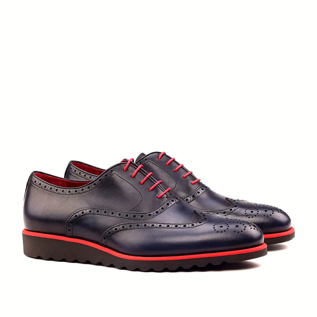 Brogue perforation on the toe cap