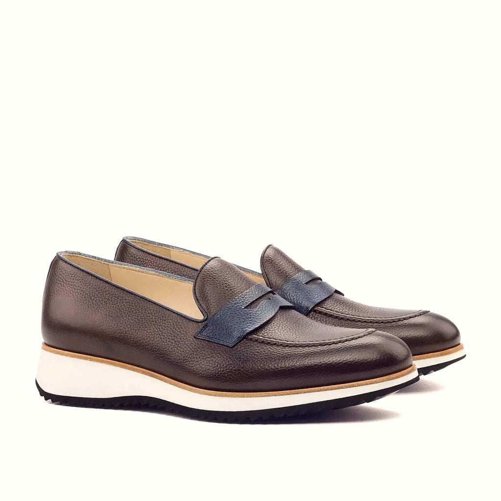 Dark brown painted full grain on the loafer