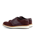 Dark brown box calf carrying the shoe