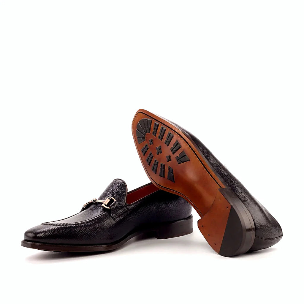 Leather sole with rubber mountain injections