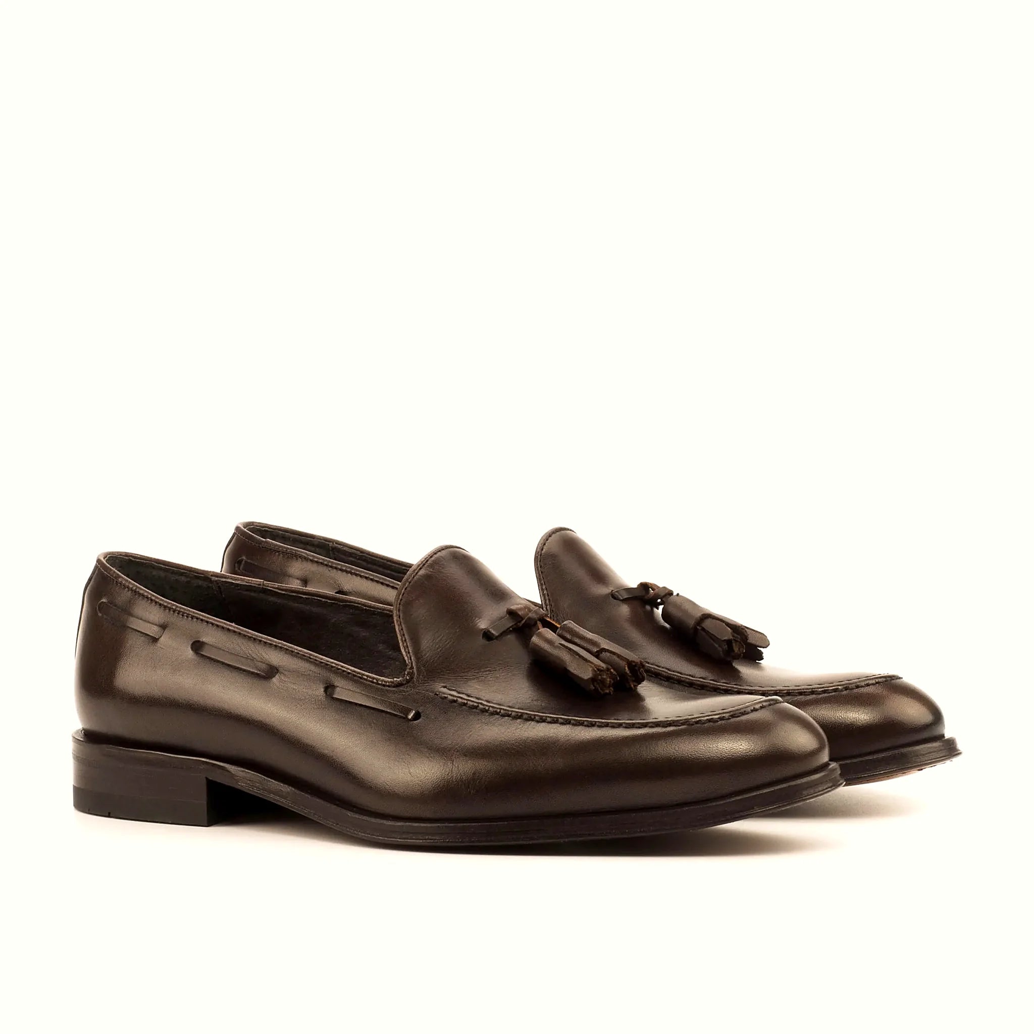 Dark brown box calf loafer with no fastening