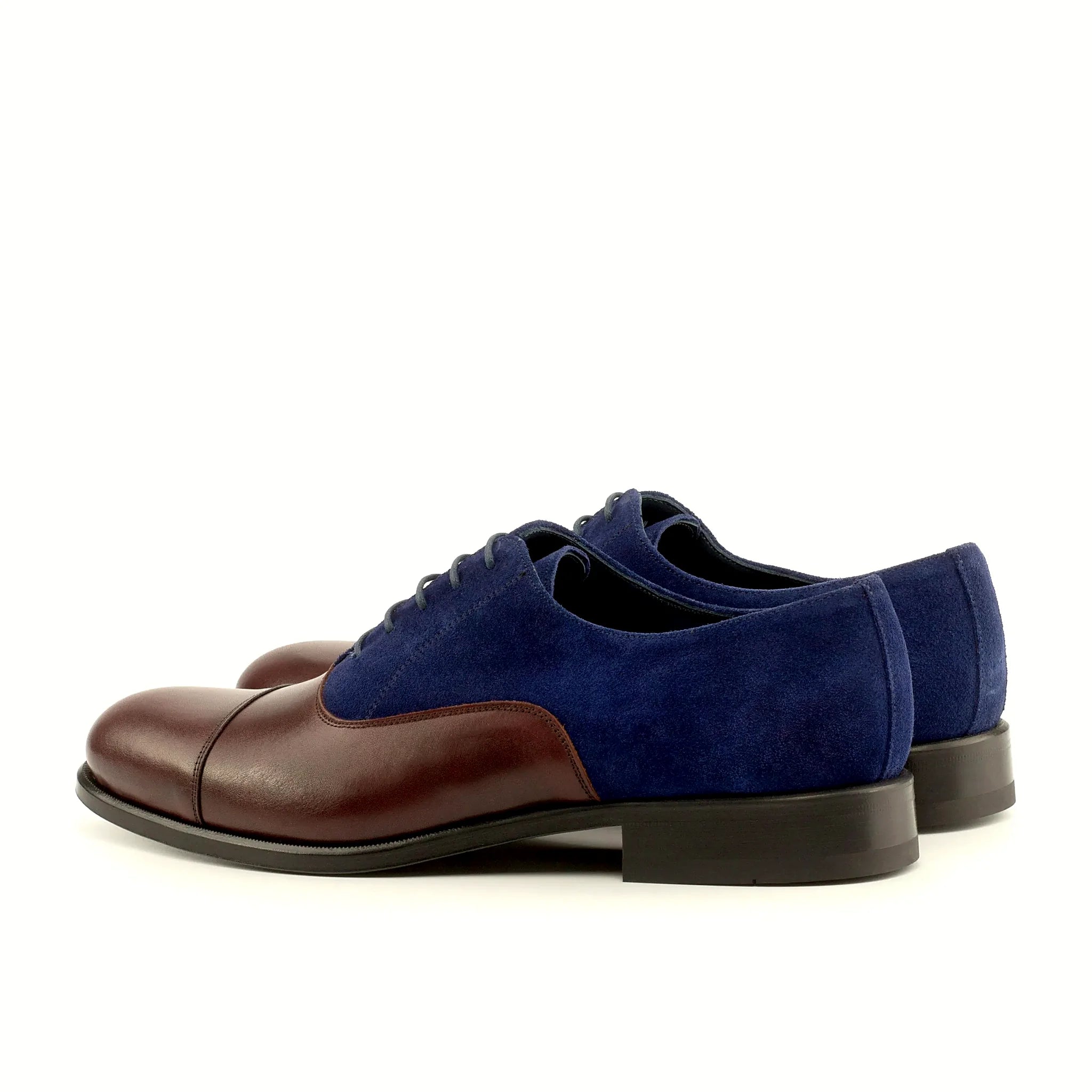 Light navy suede beside the burgundy calf