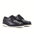 Navy box calf across the whole upper